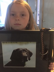 Photo of Amy's daughter and poisoned dog Abby